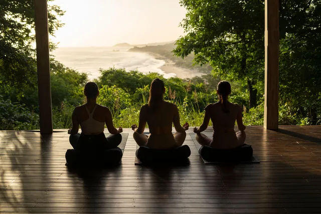 A yoga class overlooking the coast